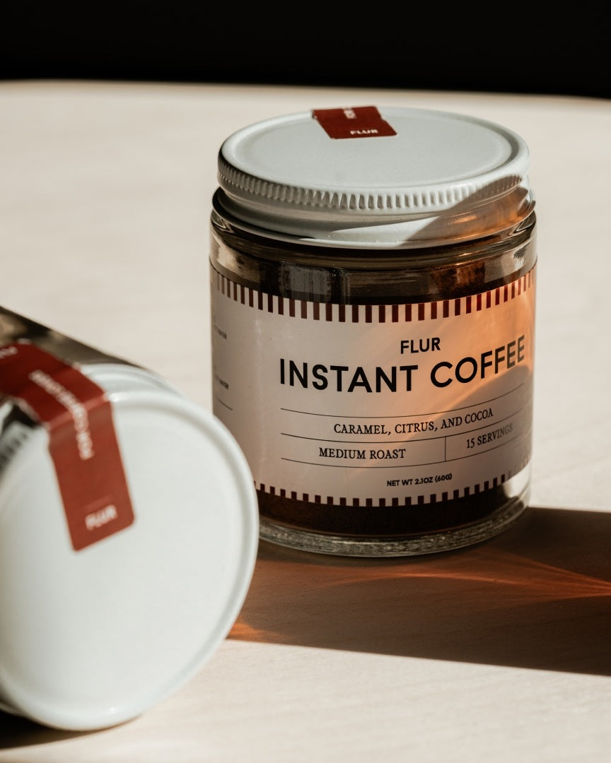 FLUR instant coffee jar in warm light